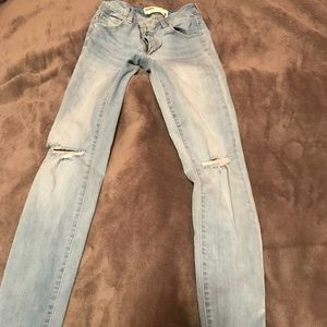 Skinny light wash jeans.